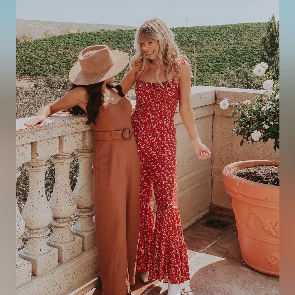 Storia bell bottom romper size small